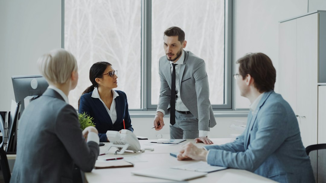 Business professionals analyzing financial data and Bitcoin market movements