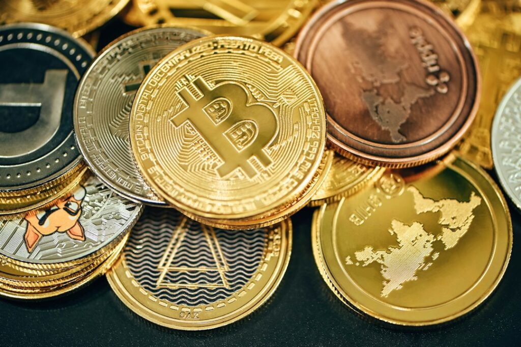 Pile of Bitcoin and cryptocurrency coins representing retail investor interest
