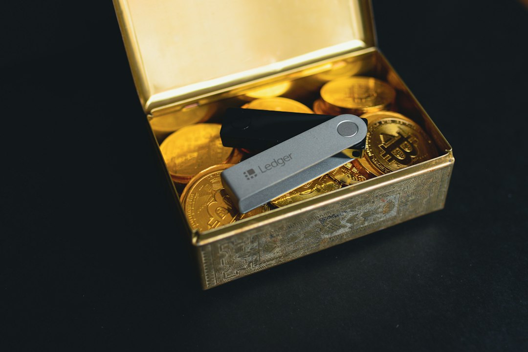 Close-up of Swiss army knife and gold coins, symbolising the threat to cryptocurrency assets