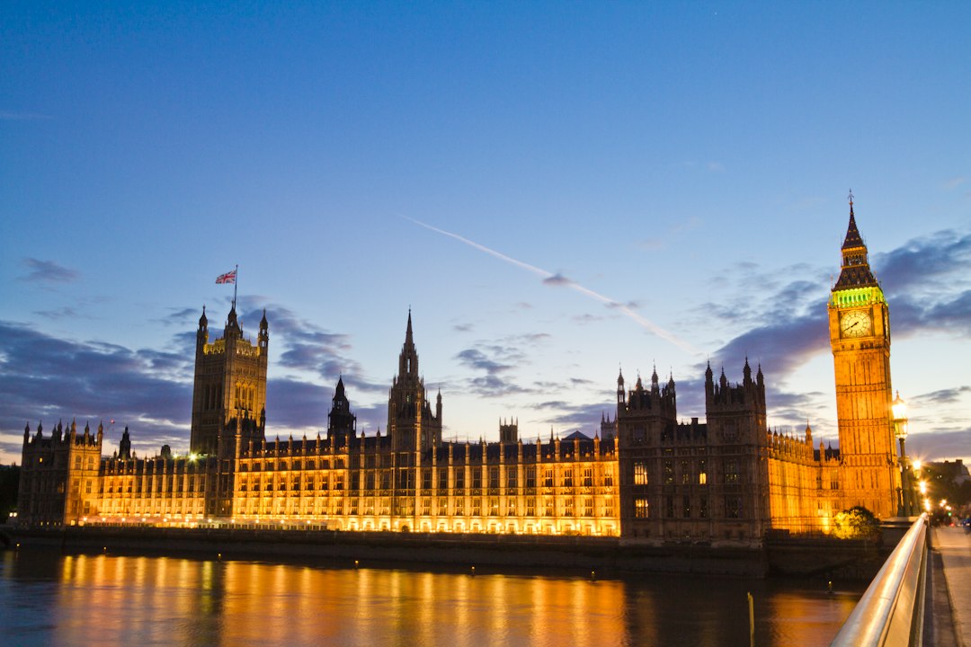 Big Ben and the Houses of Parliament at dusk, representing UK government and tax regulation